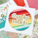 Colorful card with 'thanks & much' text on a floral background