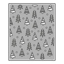 Metal die cut template with Christmas tree pattern on a gray background