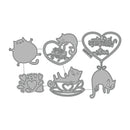 Set of cat-themed metal dies on a white background