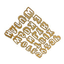 Gold metal letter stamps on a white background
