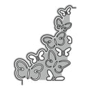 Butterfly-shaped metal cutting dies on a white background