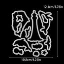 Metal die cut with floral design and measurements on a black background