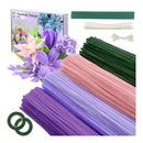 Flower arrangement supplies including sticks, ribbons, and a box of flowers on a white background.