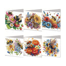 Six diamond painting cards featuring colorful floral and bee designs, arranged in two rows on a plain white background.