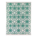 Rug with green floral pattern on a white background