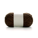 Brown skein of yarn with a white label on a white background