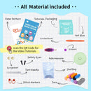 Diagram of crochet penguin kit contents with labeled items on a checkered background.