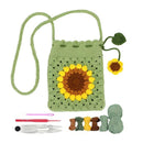 Crocheted sunflower bag with yarn and tools on a white background