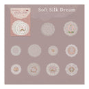 Collection of soft silk dream designs on a gray background with a sample card.
