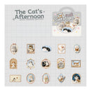 Collection of cat-themed soft plushies with packaging on a grid background