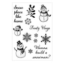 Set of black and white winter-themed stamps with snowmen, snowflakes, and text on a white background.