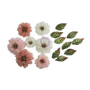 A set of artificial flowers and leaves on a plain white background. The flowers include three pink blossoms, two white blossoms, and one white blossom with a lavender center, alongside nine green leaves with brown and reddish accents.