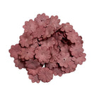 Pink flower-shaped objects on a white background