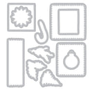 Set of metal dies with various shapes on a white background