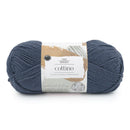 Blue skein of yarn with a label on a white background