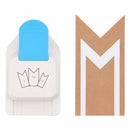 Letter 'M' cutout and paper puncher on a white background