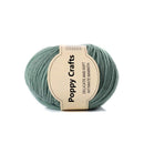 Green skein of yarn with a Poppy Crafts label on a white background