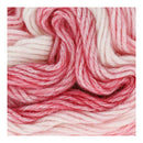 Close-up of pink and white yarn skein
