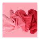Pink and red textured fabric on a pink background
