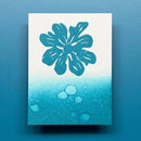 Blue floral design on a gradient blue background
