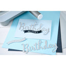 Metallic birthday-themed cutouts on a blue card with 'Birthday Wishes' text.