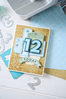 Card with number 12 and text 'Approved Today' on a textured surface