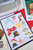 Set of decorative stickers with hats, scarves, and balloons on a white background.