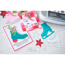 Card with ice skate design and cutout shapes on a white surface