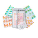 Decorative paper with geometric patterns and a cutting tool on a white background