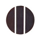 Round dark brown object with white stripes on a white background