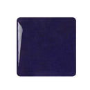 Navy blue square tile on a white background