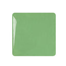 Green square tile on a white background