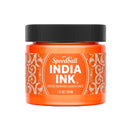 Orange jar of Speedball India Ink with black lid on a white background