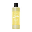 Yellow bottle with black cap on a white background