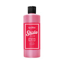 Pink bottle of Speedball Studio Plus on a white background