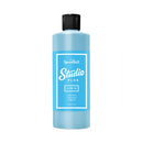 Blue bottle with black cap labeled 'Speedball Studio Plus' on a white background