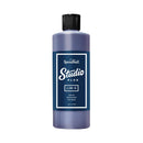 Purple bottle with black cap labeled 'Speedball Studio Plus' on a white background