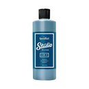 Blue bottle of Speedball Studio Plus ink on a white background