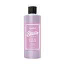 Purple bottle with black cap on a white background