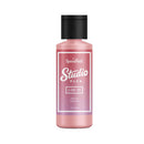 Pink bottle with black cap on a white background