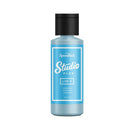 Blue bottle labeled 'Speedball Studio Plus' on a white background