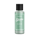Green bottle labeled 'Speedball Studio Plus' on a white background