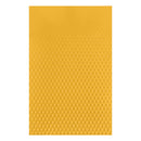 Yellow pegboard with a textured surface on a white background