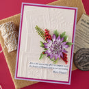 Greeting card with floral design and text on a textured surface