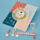 Decorative kitchen-themed card with utensils on a blue background
