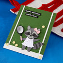 Birthday card with a raccoon holding a tennis racket on a blue background