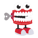 Cartoon character with a red mouth, black eyes, and holding a key on a white background