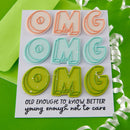 Clear stamps with 'OMG' text and humorous quote on a green background