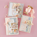 Decorative greeting cards with floral elements and ribbons on a pink background