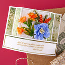 Greeting card with floral design and quote on a red background